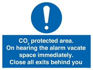 MN7906: CO₂ protected area. On hearing the alarm vacate space immediately. Close all exits behind you