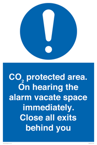 MN7906: CO₂ protected area. On hearing the alarm vacate space immediately. Close all exits behind you