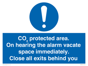 MN7906: CO₂ protected area. On hearing the alarm vacate space immediately. Close all exits behind you
