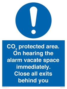 MN7906: CO₂ protected area. On hearing the alarm vacate space immediately. Close all exits behind you