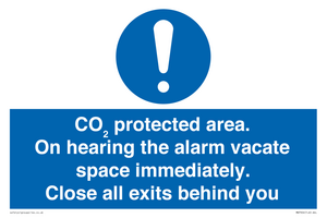MN7906: CO₂ protected area. On hearing the alarm vacate space immediately. Close all exits behind you