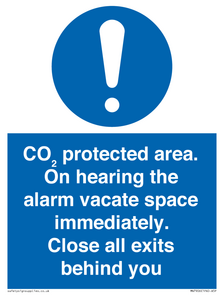 MN7906: CO₂ protected area. On hearing the alarm vacate space immediately. Close all exits behind you