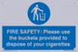 MV10334: FIRE SAFETY: Please use the buckets provided to dispose of your cigarettes
