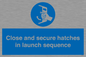 MV7520: Close and secure hatches in launch sequence