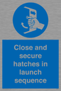 MV7520: Close and secure hatches in launch sequence