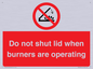 PM12634: Do not shut lid when burners are operating