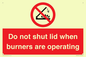 PM12634: Do not shut lid when burners are operating