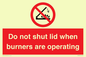 PM12634: Do not shut lid when burners are operating