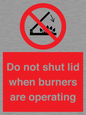 PM12634: Do not shut lid when burners are operating