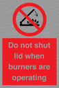 PM12634: Do not shut lid when burners are operating