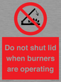 PM12634: Do not shut lid when burners are operating