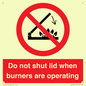 PM12634: Do not shut lid when burners are operating