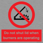 PM12634: Do not shut lid when burners are operating