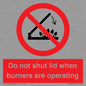 PM12634: Do not shut lid when burners are operating