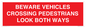 PR12804: BEWARE VEHICLES CROSSING (PEDESTRAINS LOOK BOTH WAYS)
