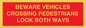 PR12804: BEWARE VEHICLES CROSSING (PEDESTRAINS LOOK BOTH WAYS)