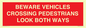 PR12804: BEWARE VEHICLES CROSSING (PEDESTRAINS LOOK BOTH WAYS)