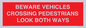 PR12804: BEWARE VEHICLES CROSSING (PEDESTRAINS LOOK BOTH WAYS)