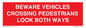 PR12804: BEWARE VEHICLES CROSSING (PEDESTRAINS LOOK BOTH WAYS)