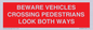 PR12804: BEWARE VEHICLES CROSSING (PEDESTRAINS LOOK BOTH WAYS)