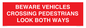 PR12804: BEWARE VEHICLES CROSSING (PEDESTRAINS LOOK BOTH WAYS)