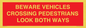 PR12804: BEWARE VEHICLES CROSSING (PEDESTRAINS LOOK BOTH WAYS)