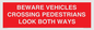 PR12804: BEWARE VEHICLES CROSSING (PEDESTRAINS LOOK BOTH WAYS)