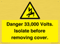 WE12404: Danger 33,000 Volts. Isolate before removing cover.