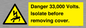 WE12404: Danger 33,000 Volts. Isolate before removing cover.