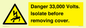 WE12404: Danger 33,000 Volts. Isolate before removing cover.