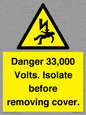 WE12404: Danger 33,000 Volts. Isolate before removing cover.