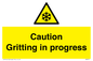 WK6311: Caution Gritting in progress
