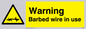 WU598: warning barbed wire in use