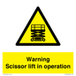 WV17048: Warning Scissor lift in operation